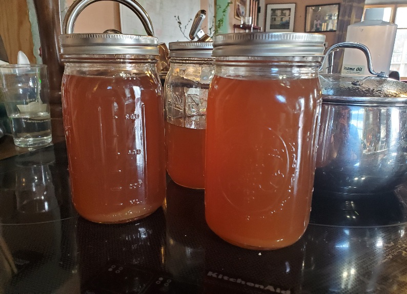 homemade vegetable broth in mason jars
