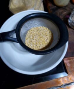 Mung dal measured out in a strainer