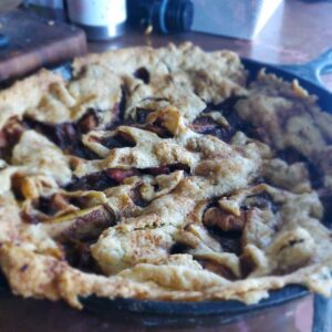 green chile apple pie in cast iron skillet